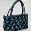 Navkala small designer handbag